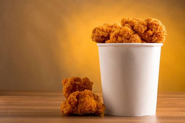 istock Crispy fried chicken in the bucket. Chicken bucket. 1408337813