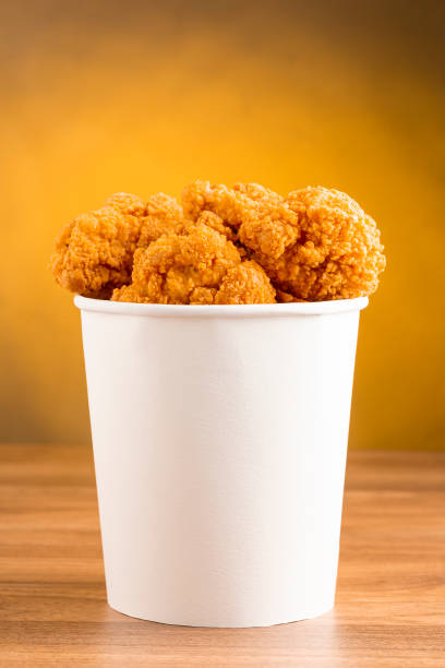 istock Crispy fried chicken in the bucket. Chicken bucket. 1408337816