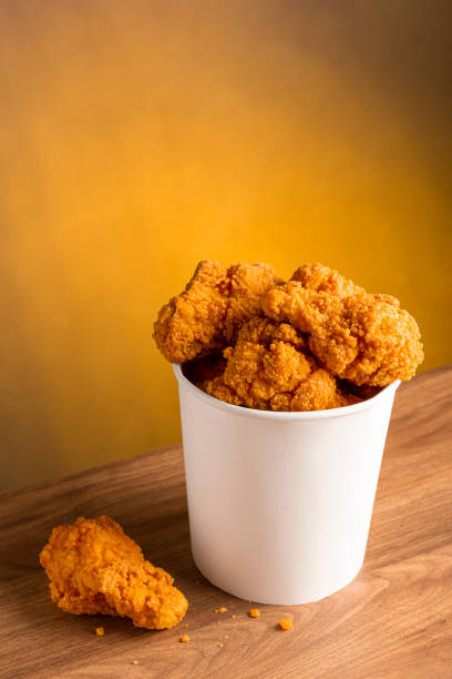istock Crispy fried chicken in the bucket. Chicken bucket. 1408337819