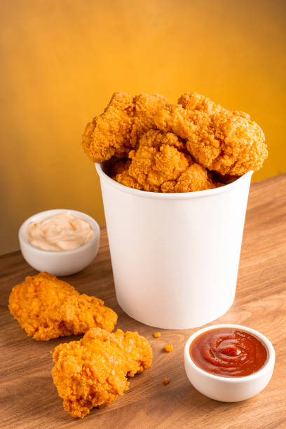 istock Crispy fried chicken in the bucket. Chicken bucket. 1408337822