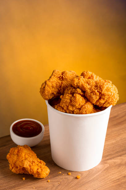 istock Crispy fried chicken in the bucket. Chicken bucket. 1408337823