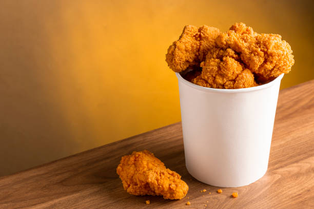 istock Crispy fried chicken in the bucket. Chicken bucket. 1408337824