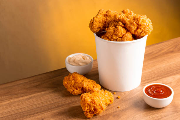 istock Crispy fried chicken in the bucket. Chicken bucket. 1408337827