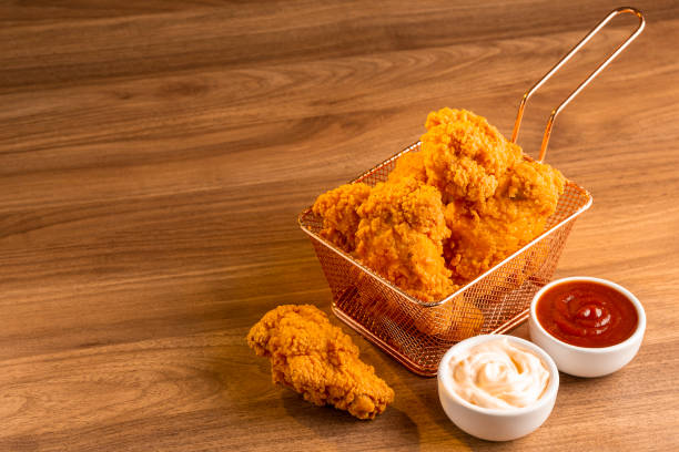 istock Crispy fried chicken in the basket. 1408338338