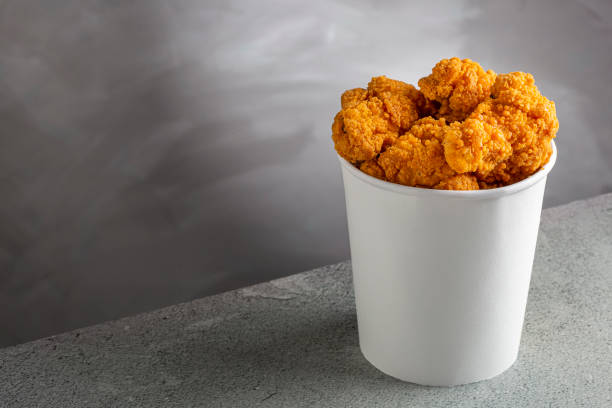 istock Crispy fried chicken in the bucket. Chicken bucket. 1408338347