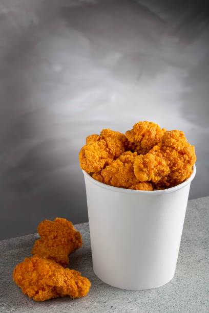 istock Crispy fried chicken in the bucket. Chicken bucket. 1408338369