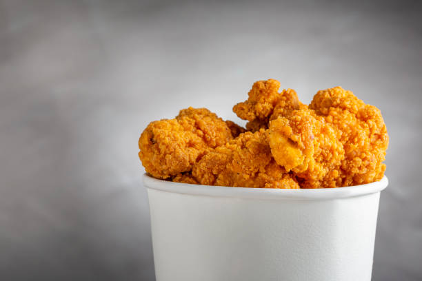 istock Crispy fried chicken in the bucket. Chicken bucket. 1408338376