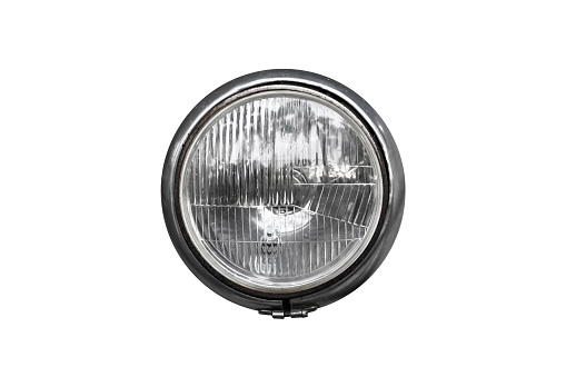Round vintage headlight, old-timer vehicle detail isolated on white background