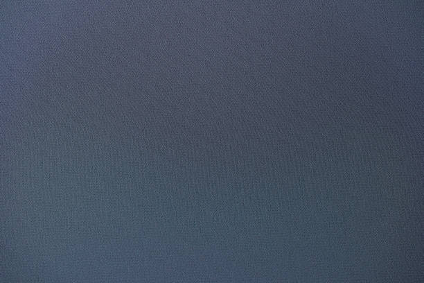 istock Dark blue cotton synthetic fabric background. Advertising texture concept 1408348533