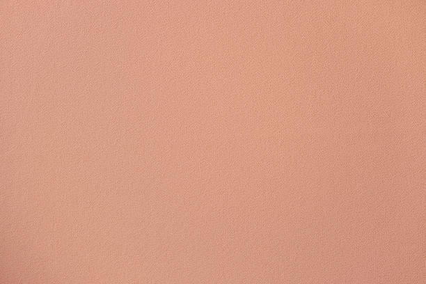 istock Plain pink fabric texture background. Delicate pink color and advertising banner 1408348543