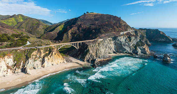 The pacific highway one crossing an old bridge at the Big Sur coastline in California, USA.