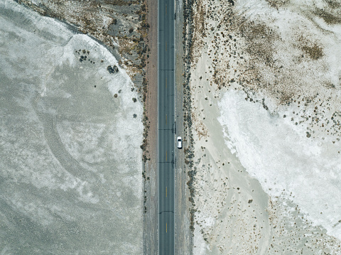 Road trip highway in the desert of Death Valley, California, seen from above.