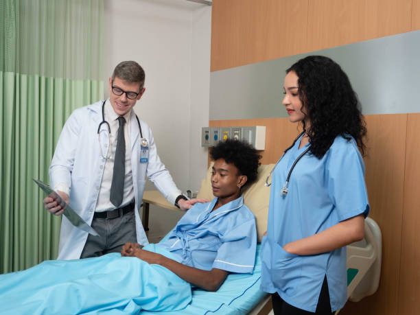 istock doctor and nurse explain about sickness good improvement for patient 1408353888