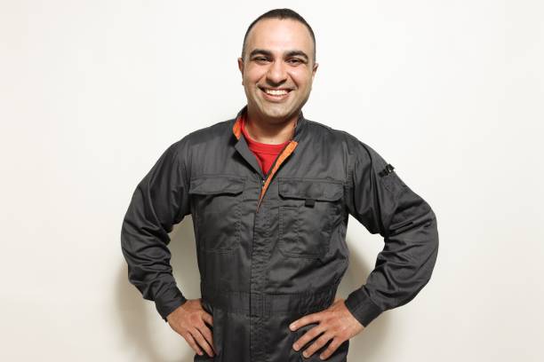 Portraits of Middle Eastern man looking at camera shot in a studio with white background.  Capture warm, confident, and authentic people imagery.
