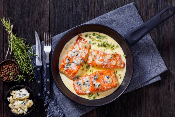 istock salmon fillet with creamy blue mold cheese sauce 1408358062