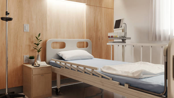 istock comfortable Hospital room with bed and equipment 1408360170