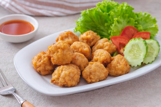 istock Deep fried shrimp ball and vegetable on plate 1408360223