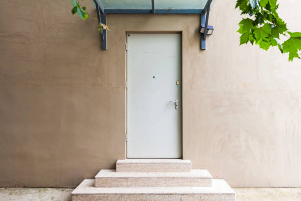 An entrance with iron gates closed