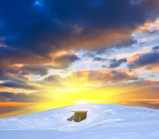 sunset among a winter hills