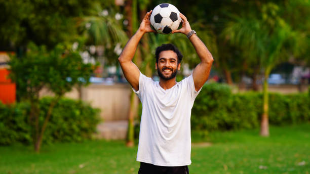 istock indian handsome man of a soccer player 1408370194