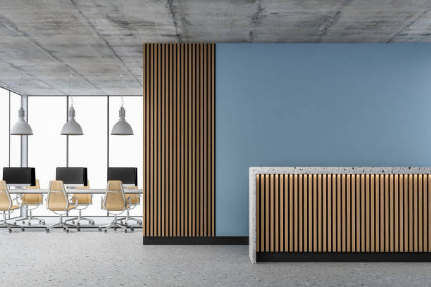 istock Empty office interior with copy space, work desks and reception desk on terrazzo floor 1408371382