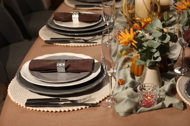 istock Beautiful autumn place setting and decor for festive dinner on table 1408371964