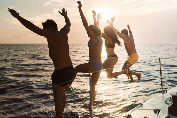 istock Jump from a boat at sunset! 1408374243