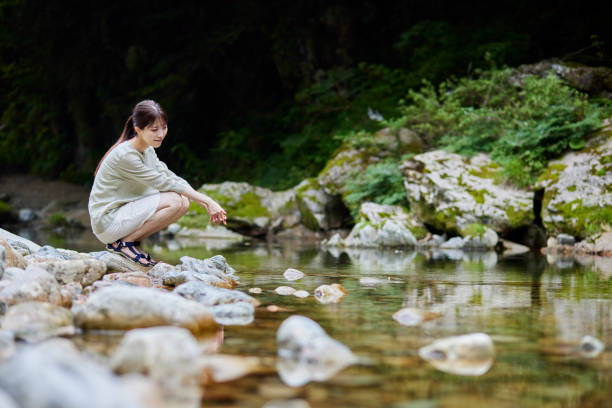 istock Beautiful rivers and young Japanese women 1408376896