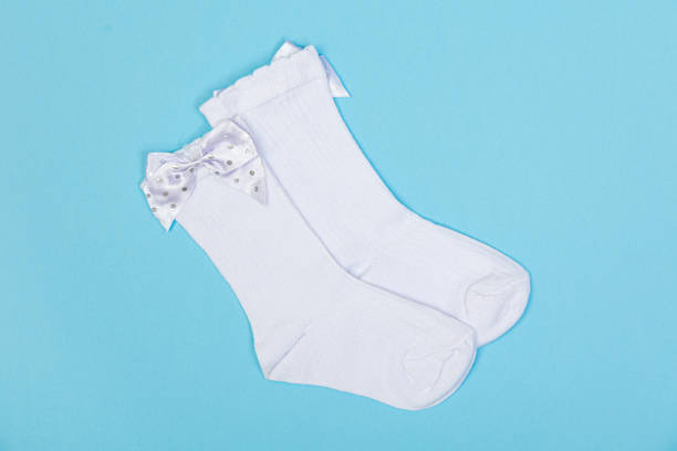 istock high white children's socks with big bows for festive clothes on a blue background 1408378920