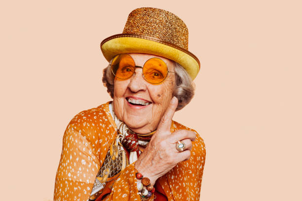 istock A very old funny woman in a hat at studio 1408378982