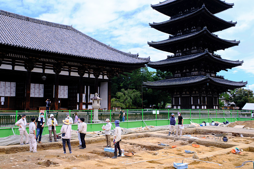 Nara, Japan  September 29, 2021: An archaeological dig on the grounds of Kofukuji Temple. Researchers are still discovering new historical sites and artifacts in and around Nara, which served as Japan's capital from 710 to 784 before being relocated to Kyoto.