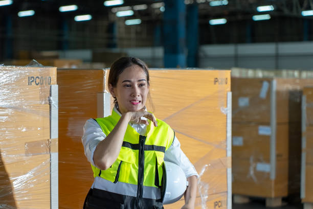 istock Female engineer wipe away the sweat on her face. 1408383415
