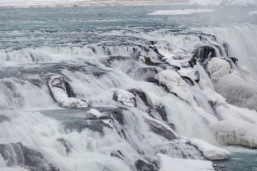 Gullfoss (translated to ‘Golden Falls’) is one of Iceland’s most iconic and beloved waterfalls, found in the Hvítá river canyon in Southwest Iceland. The water in Hvítá river travels from the glacier Langjökull, before cascading 32 meters (105 feet) down Gullfoss’ two stages in a dramatic display of nature’s raw power. This incredible site is seen by most visitors, as it is on the Golden Circle sightseeing route.