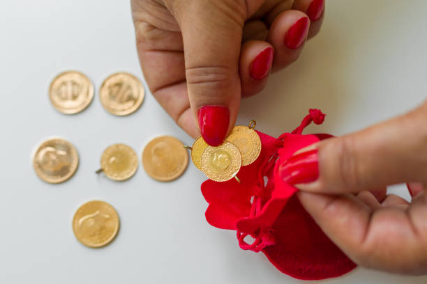 istock Woman with gold coins 1408386756
