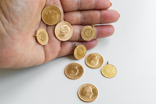 Woman with gold coins