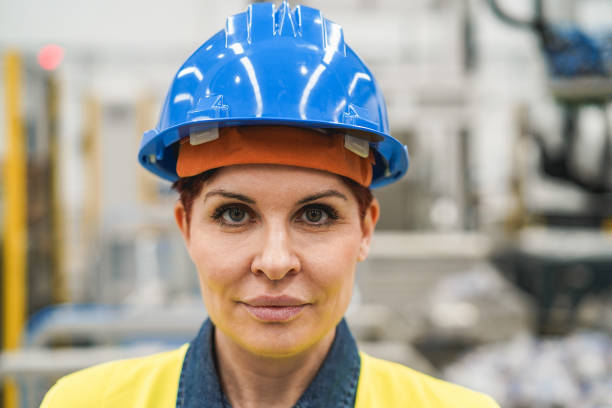 istock Engineer woman working inside robotic factory - Industrial and technology concept 1408388267