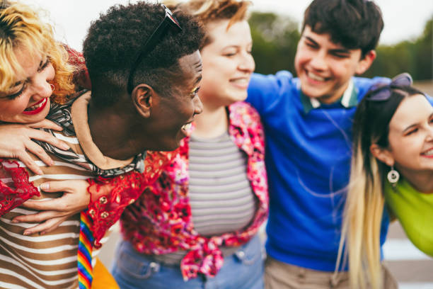 istock Young multiracial people having fun outdoor laughing together 1408388361