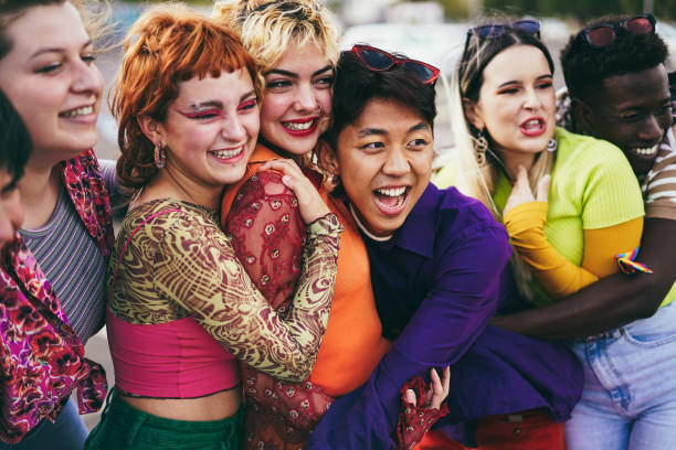 istock Young diverse people having fun outdoor laughing together 1408388367