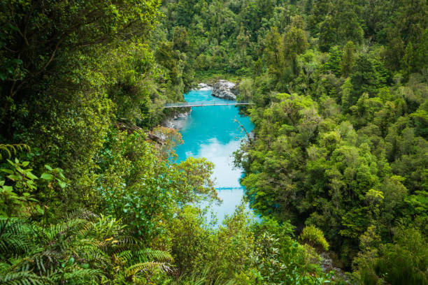 istock Swing bridge crossing to beautiful Hokitika Gorge. 1408389264