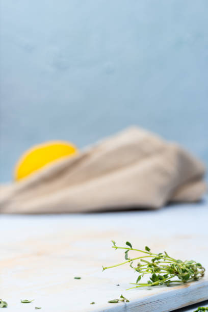 Wooden Board and Defocused Food Background.