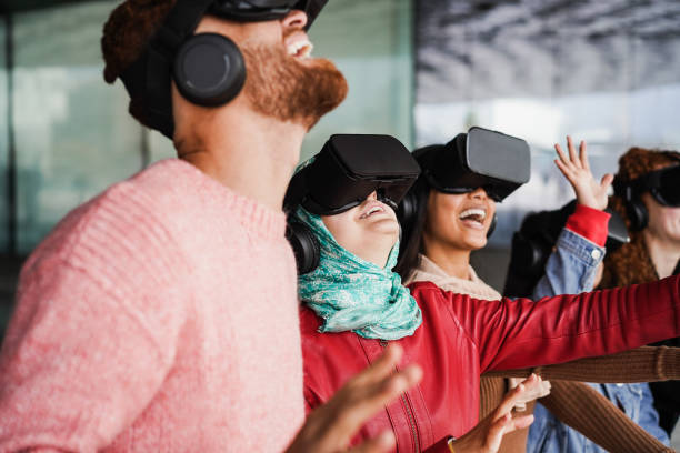 istock Young people wearing virtual glasses outdoor - Metaverse concept 1408390113