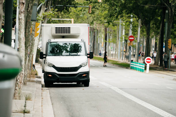 istock Delivery van in a city street 1408390730