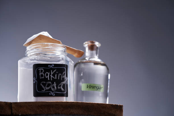 istock baking soda and white vinegar against gray background 1408395075