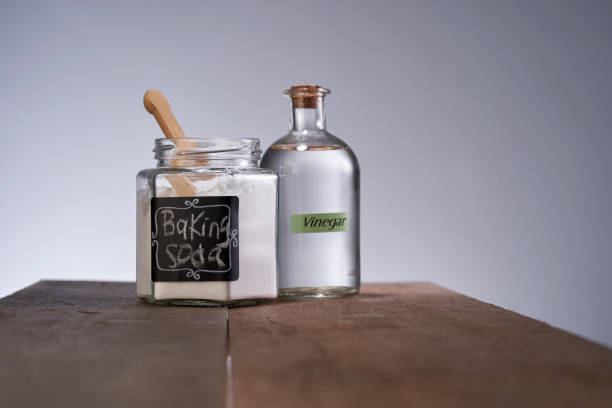 istock baking soda and white vinegar against gray background 1408395092