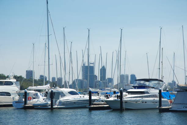 Matilda Bay is a picturesque part of Perth where boats are moored, and the Perth skyline is visible