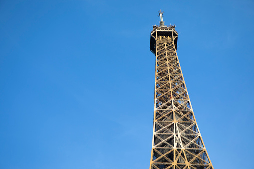 cloudy day with The Eiffel tower in Paris, the most romatic symbol architecture in europe located in france