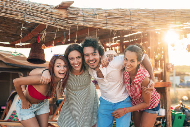 istock Friends at a beach camp 1408402097