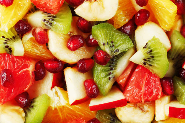 istock Fruit salad close-up in full screen, as a background. 1408403493