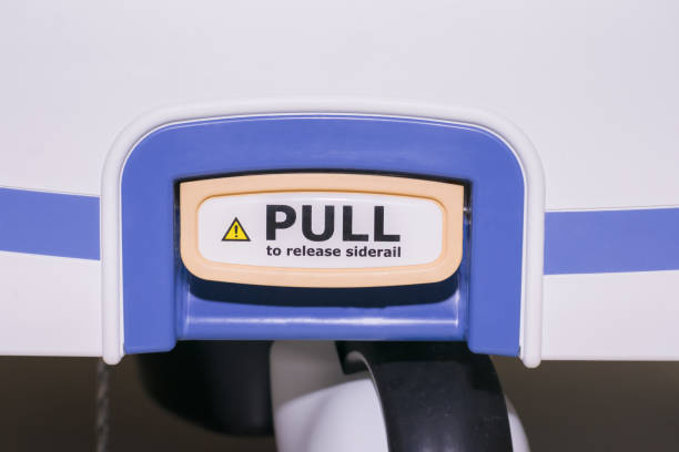 istock Lever to release siderail of an adjustable hospital bed. 1408411113
