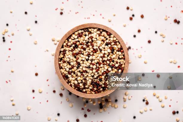 Close Set Of Three Varieties Of Uncooked Quinoa On White Background Top View Stock Photo - Download Image Now